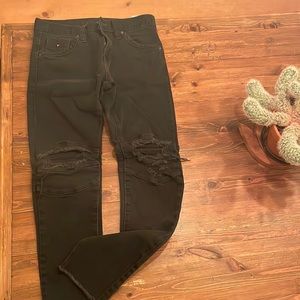 Guess black distressed moto skinny jeans